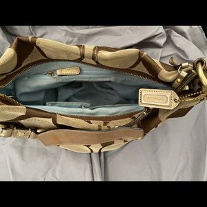 Authentic Coach hobo/east west shape.